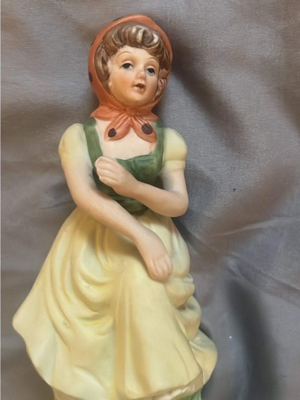 Porcelain Figurine in Yellow Dress with Green Apron and Coral Headscarf